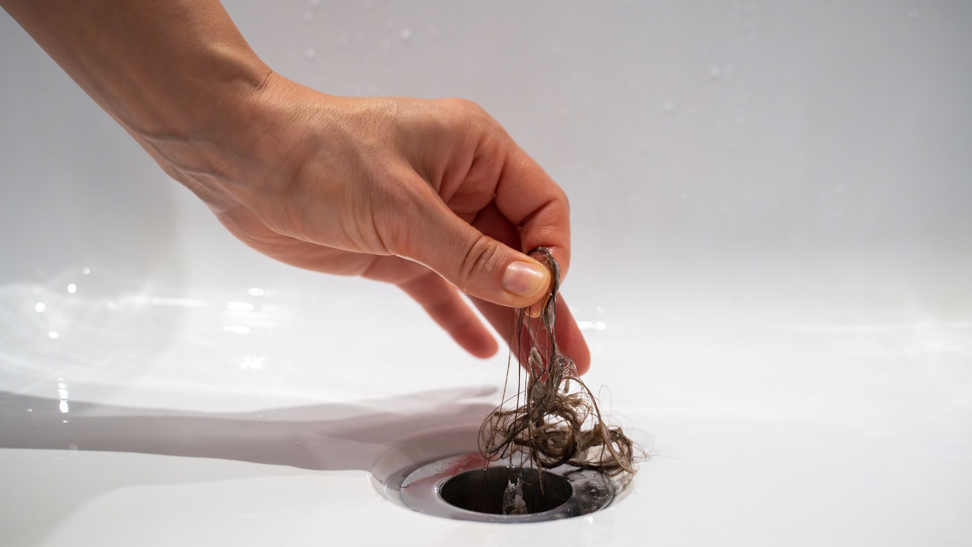 Hair and Debris Removal by plumber