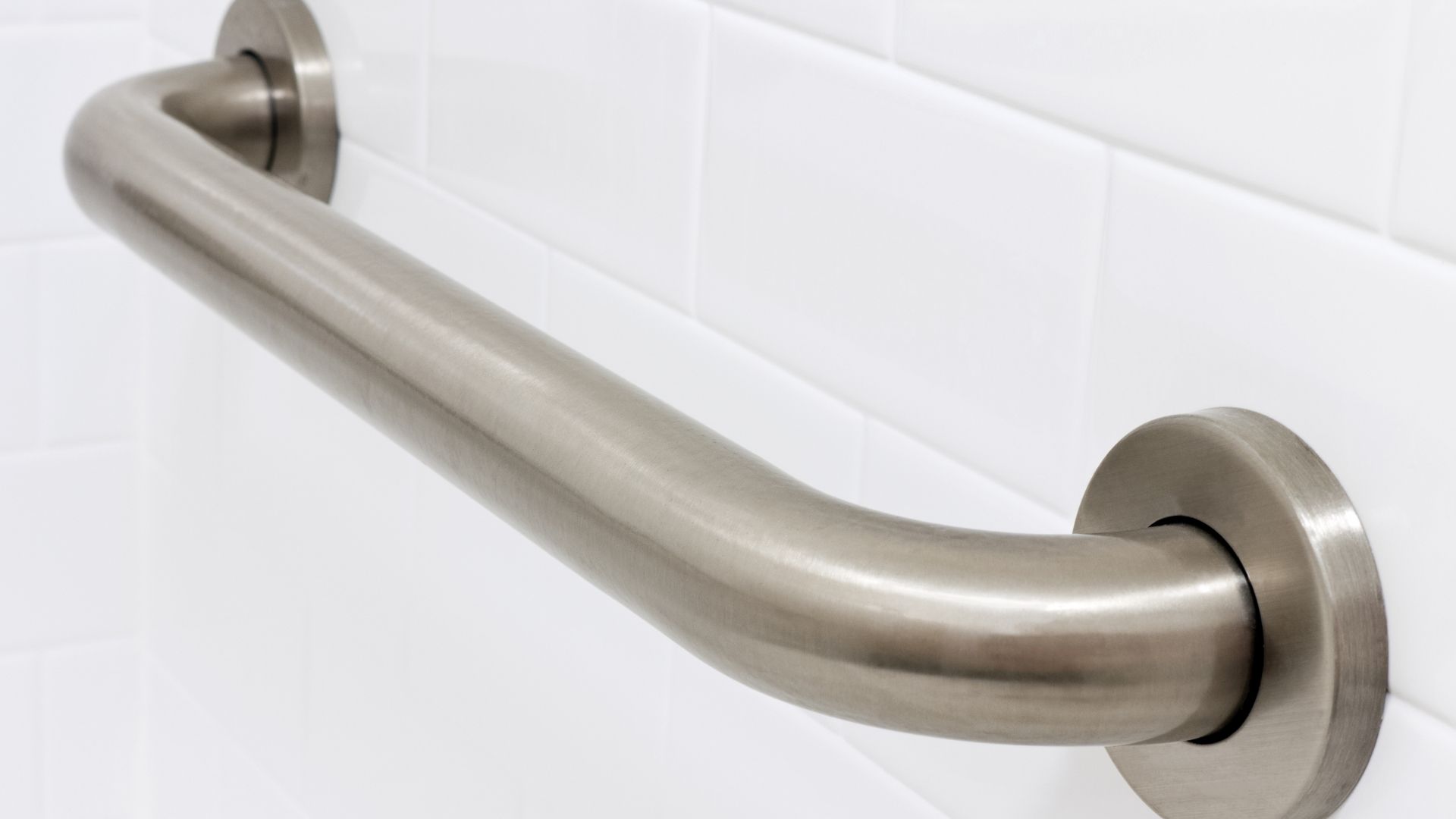 Installation of grab bars, particularly for plumbers.